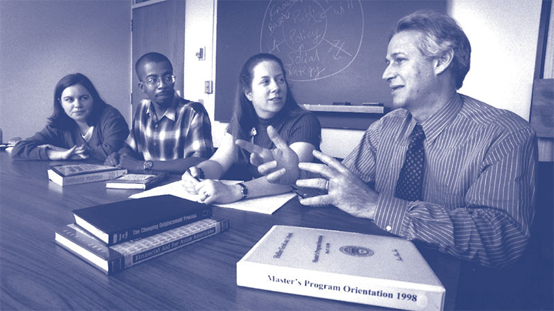 Former Heller Dean Jack Shonkoff with students
